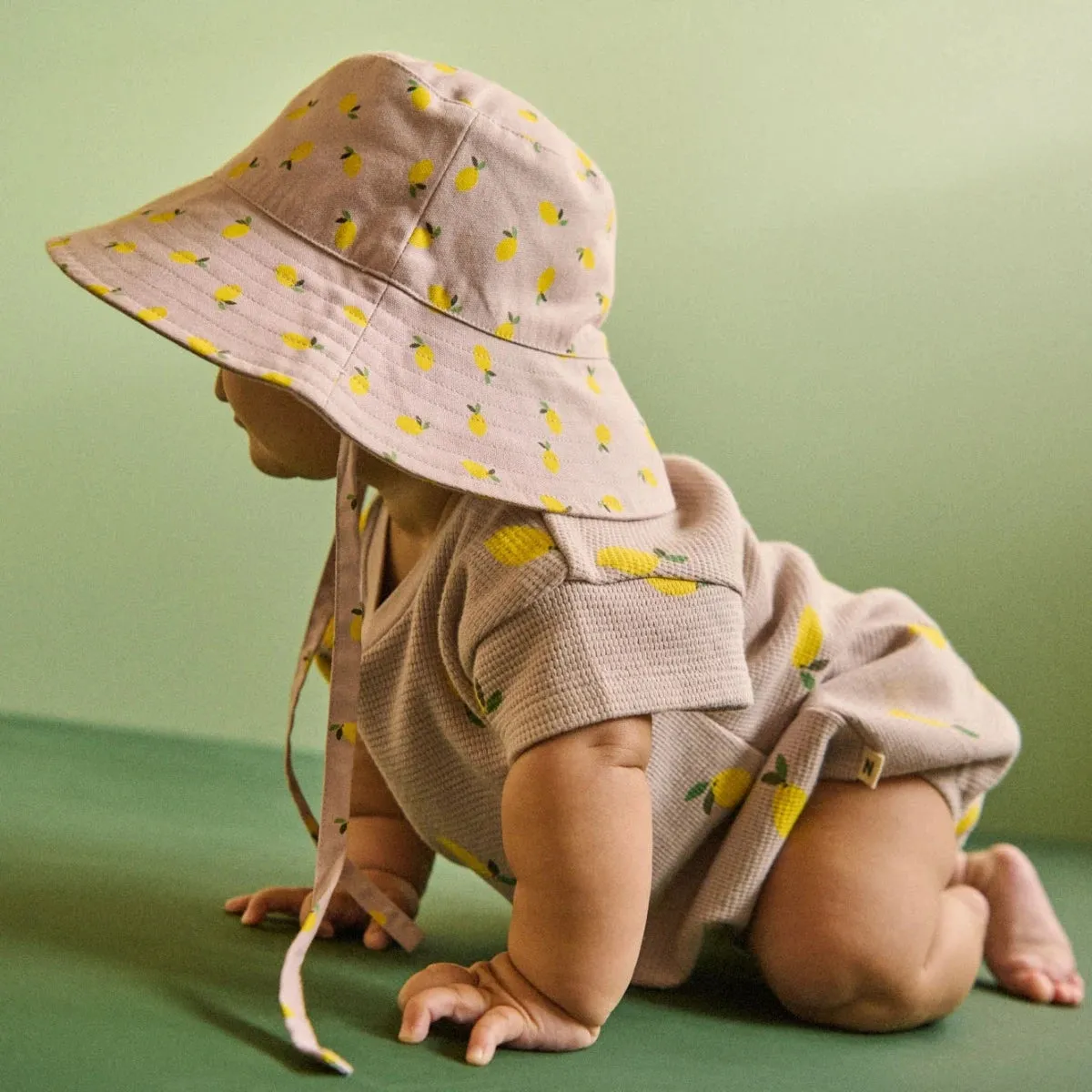 NATURE BABY HOLIDAY SUNHAT PETITE LILAC LEMON PRINT